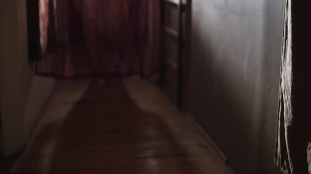 Attractive Young Female In Seductive Dress Walking Past Curtains