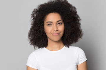 Head shot portrait beautiful African American girl looking at camera