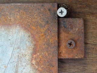 closeup of screw and rusted metal
