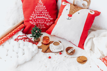 Flat lay Cozy winter holiday. Christmas background. Marshmallow and christmas decoration on a light background.