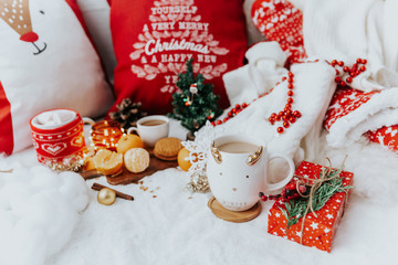  Christmas composition. Still life image with cup of coffee, tangerines, and Christmas decorations