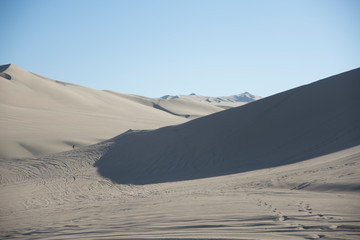 Fototapeta na wymiar Sand dunes in la huacachina, ica desert, Peru