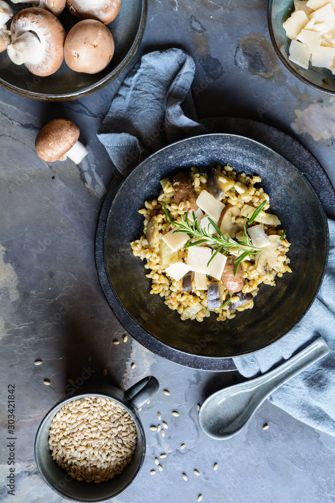 Wall mural Vegetarian barley risotto with roasted mushrooms, fennel and Parmesan cheese slices - Wall murals