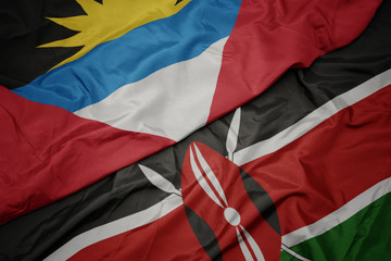 waving colorful flag of kenya and national flag of antigua and barbuda.