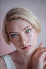 Portrait of a short-haired bride. The bride without retouching. Beauty and fashion portrait of a beautiful bride.