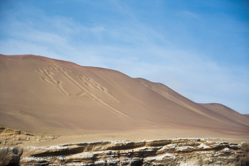 Fototapeta na wymiar Candelabro sand figure in Paracas Natural Reserve, Peru