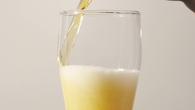 Pouring beer into a glass