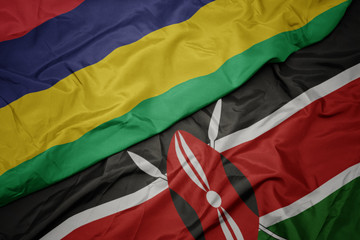 waving colorful flag of kenya and national flag of mauritius.