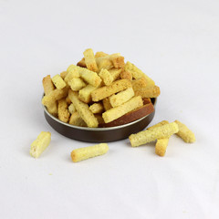 potato chips in a bowl isolated on white