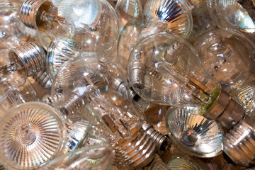 Broken light bulbs in a rubbish bin for recycling 