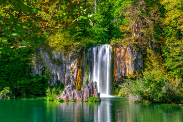 Scenic waterfalls in a beautiful picturesque autumn scenery of the Plitvice Lakes National Park in Croatia