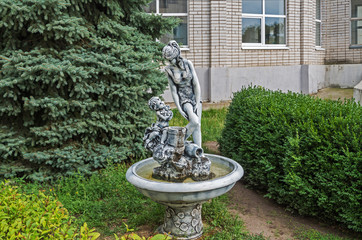 Patio and statue in form of fountain