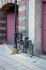 bicycle in front of an old house