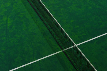Fototapeta premium Tennis court indoor with green carpet surface