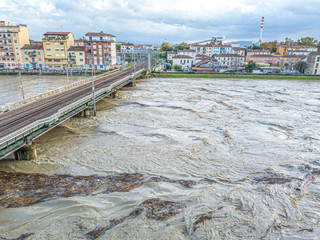 Details fo train's bridge with swallen river, Pisa, Italy.