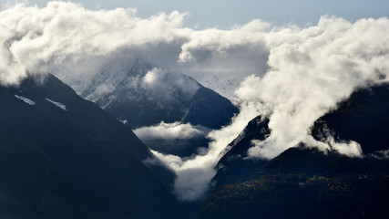 Fototapeta na wymiar Cloudscape on the orobic alps in Valtellina