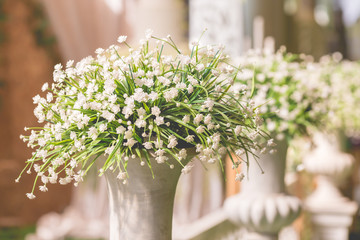 Fototapeta na wymiar Bouquet white flowers decor in wedding ceremony