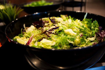 Green leaf salad in a bowl