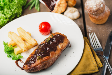 Roasted duck with blackberries,marinated in red wine