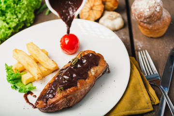 Roasted duck with blackberries,marinated in red wine