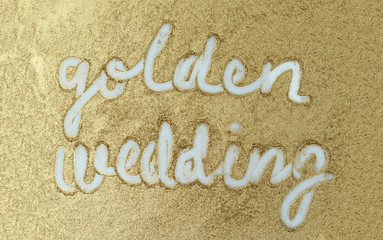 gold glitter powder on white background