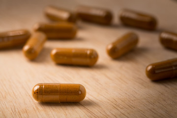 Medical herbal capsule close up