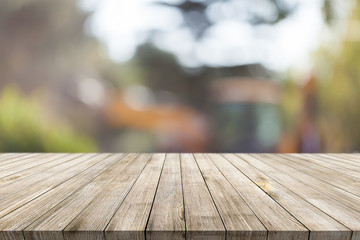 Wooden desk on bokeh blur abstract natural background