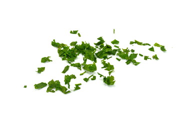Fresh green chopped parsley leaves isolated on white background and texture, top view. Chopped...