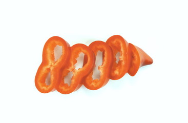Red sweet bell pepper slices isolated on white background cutout.