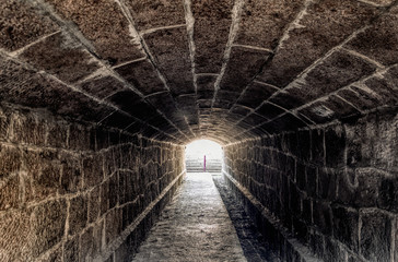 Old creepy underground stone tunnel. Halloween Locations