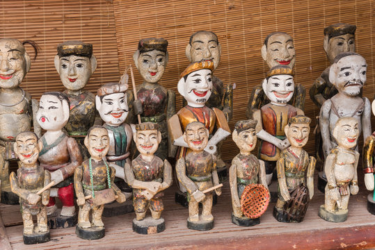 Colorful souvenir puppets used in the ancient art of water puppetry Roi Nuoc