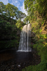 Fototapeta na wymiar sunny day at waterfall