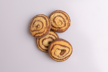Home made cookies with chocolate, butter and vanilla, isolated on white background, soft light, angle view, copy space