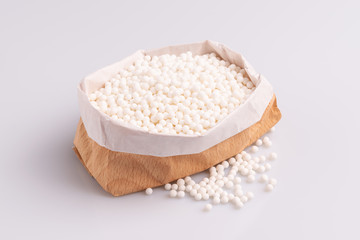 Tapioca pearls or sagu seeds, isolated on white background, soft light, studio photo