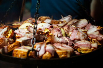 Close up photo of food being grilled durong traditional Christmas Market in Poznan, Poland. 
