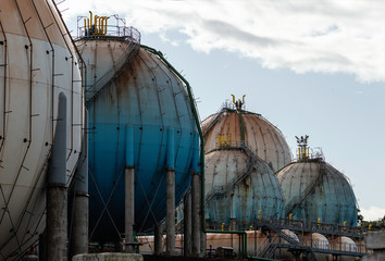 Spherical Natural Gas Tank in the Petrochemical Industry in daylight, Gijon, Asturias, Spain.
