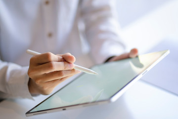 businessman working with smart phone or tablet. Modern and smart lifestyle with online mobile...