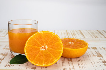 Fresh orange juice fruit drink glass over white background - tropical orange fruit for background use