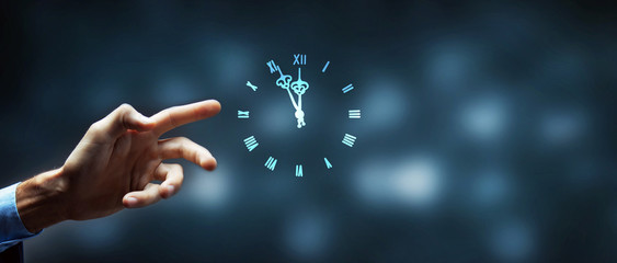 man clicks on screen clock icon