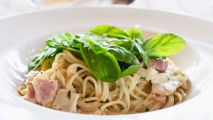 Spaghetti carbonara recipe - famous Italian dish food for background use
