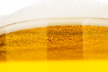 Close up beer bubble froth foam alcohol in glass