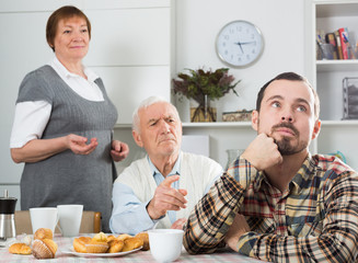 Parents arguing with son