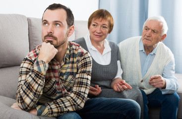 Parents arguing with son