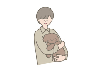 トイプードルを抱っこする男の子