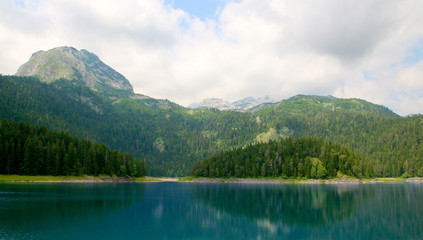 Fototapeta na wymiar Black Lake, Zablijak, Montenegro. Glacial lake located on the Mount Durmitor within the Durmitor National Park, Montenegro
