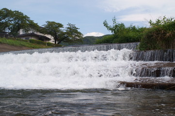 Naklejka premium Japanese river flow water splash