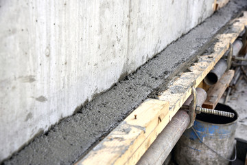 Concrete work: pouring concrete into the formwork