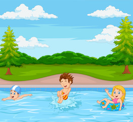 Obraz na płótnie Canvas Kids playing in swimming pool