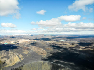 Aerial view of Hverfjall volcanic crater near Myvatn, Iceland in the summer with mountains in the...