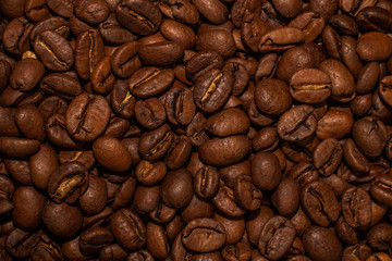 A pile of coffee beans filling the whole background